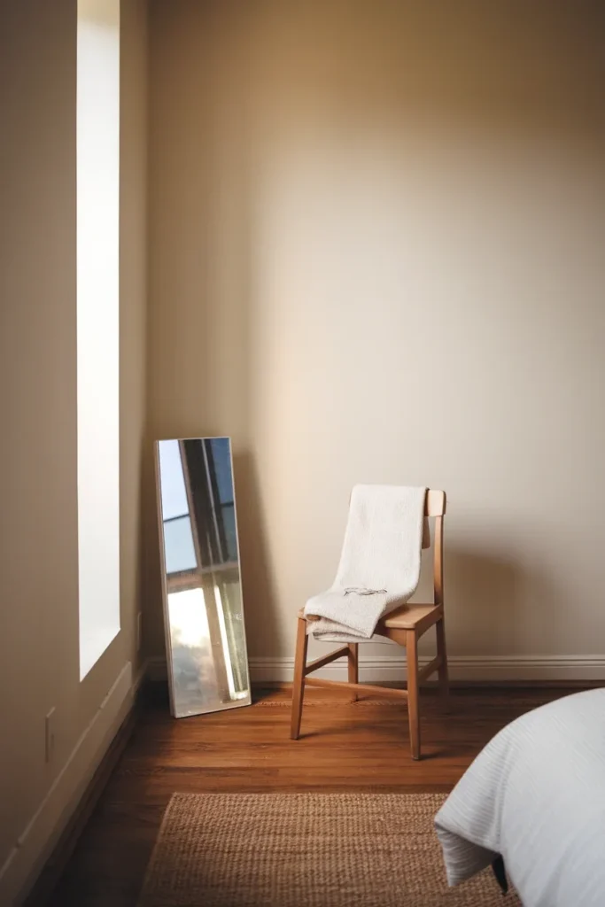 Bright north-facing window setup with a chair and mirror for at-home color analysis